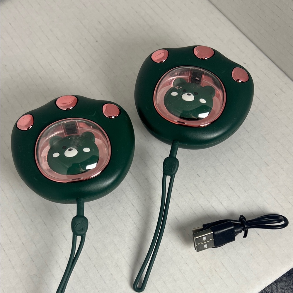 Bear Paw Wearable Hand Warmers in Green and Pink